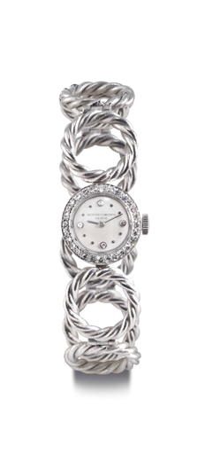 VACHERON CONSTANTIN. A LADY'S PLATINUM AND DIAMOND WRISTWATCH WITH ASSOCIATED 18K WHITE GOLD LINK BRACELET