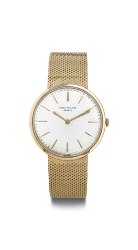 PATEK PHILIPPE. AN 18K GOLD WRISTWATCH WITH BRACELET