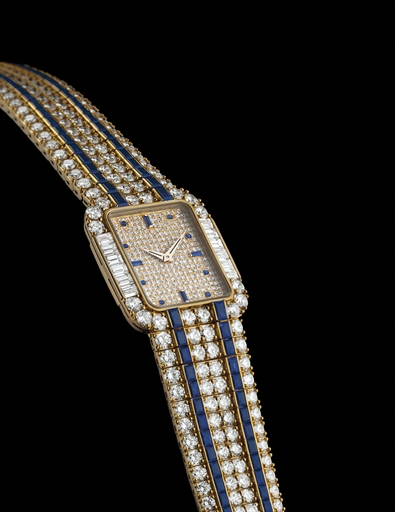 PATEK PHILIPPE. A VERY RARE AND IMPRESSIVE 18K GOLD, DIAMOND AND SAPPHIRE-SET RECTANGULAR WRISTWATCH WITH BRACELET