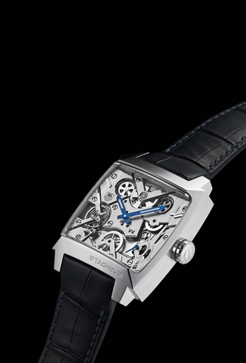 TAG HEUER. A FINE AND RARE PLATINUM LIMITED EDITION AUTOMATIC SKELETONIZED WRISTWATCH