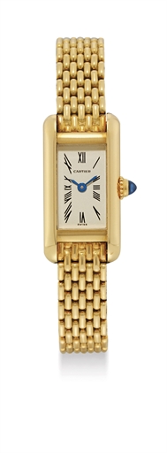 CARTIER. A LADY'S 18K GOLD RECTANGULAR WRISTWATCH WITH BRACELET