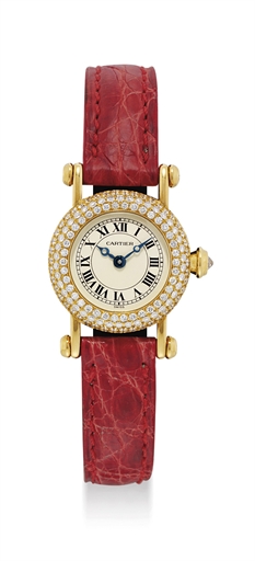 CARTIER. A LADY'S 18K GOLD AND DIAMOND-SET WRISTWATCH