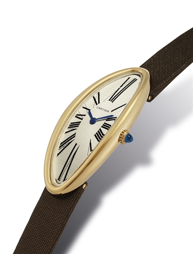 CARTIER. A LADY'S FINE 18K GOLD OVAL WRISTWATCH
