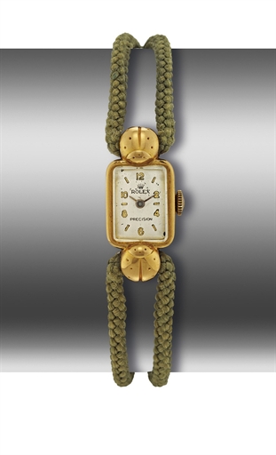 ROLEX. A LADY'S RECTANGULAR WRISTWATCH WITH UNUSUAL LUGS