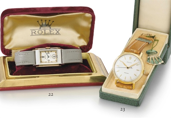Rolex. A rare and attractive stainless steel and pink gold rectangular wristwatch with stepped sides, two-tone gilt and silvered dial and box