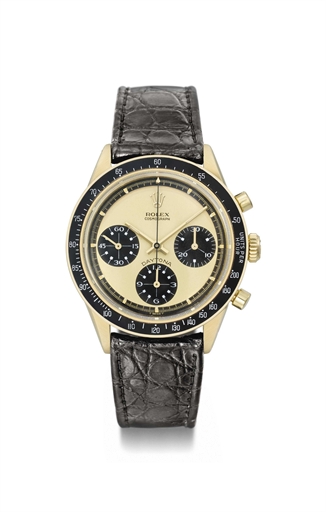 Rolex. A fine and rare 18K gold chronograph wristwatch with champagne dial