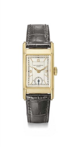 Patek Philippe. A fine, rare and attractive 18K gold rectangular curved wristwatch