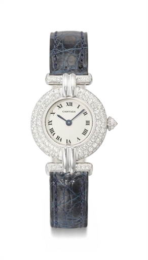 Cartier. A lady's attractive 18K white gold and diamond-set wristwatch