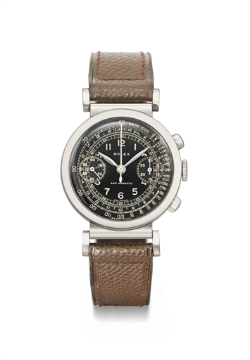 Rolex. A fine and rare stainless steel chronograph wristwatch with black dial and hooded flexible lugs