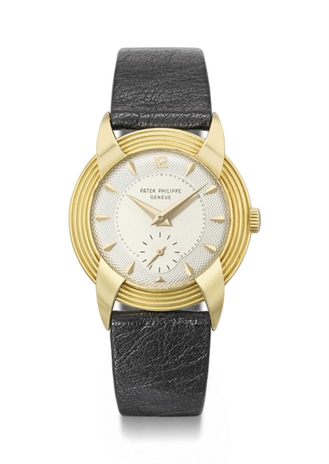 Patek Philippe. A highly unusual and rare 18K gold wristwatch with two-tone silvered guilloch