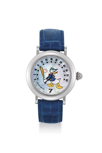 GERALD GENTA. A STAINLESS STEEL AUTOMATIC JUMP HOUR WRISTWATCH WITH MOTHER-OF-PEARL DIAL AND RETROGRADE MINUTES