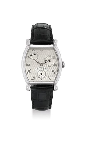 VACHERON CONSTANTIN. A PLATINUM LIMITED EDITION TONNEAU-SHAPED AUTOMATIC WRISTWATCH WITH POWER RESERVE AND DATE