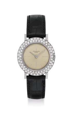PATEK PHILIPPE. A FINE AND RARE PLATINUM AND DIAMOND-SET WRISTWATCH