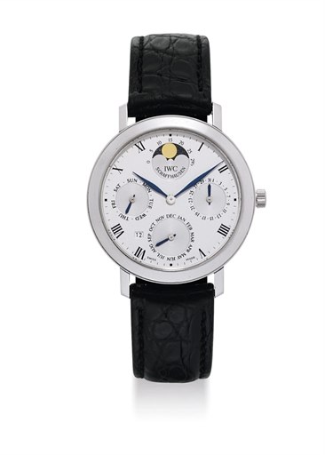 IWC. A FINE, SLIM AND RARE PLATINUM PERPETUAL CALENDAR WRISTWATCH WITH MOON PHASES AND YEAR DISPLAY