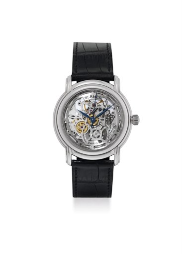 HERMÈS. A STAINLESS STEEL AUTOMATIC SKELETONISED WRISTWATCH WITH SWEEP CENTRE SECONDS