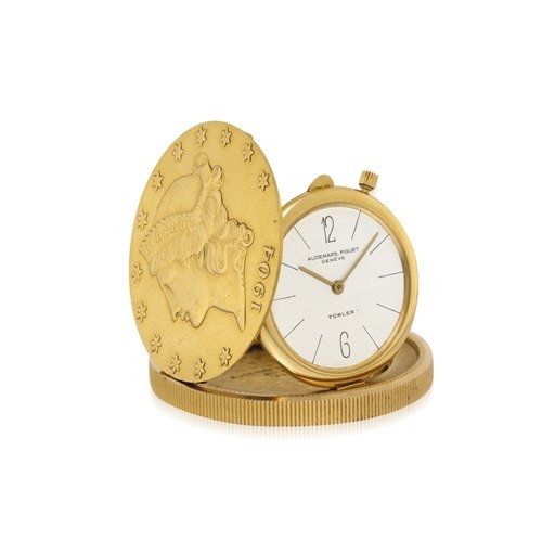 AUDEMARS PIGUET. AN 18K GOLD TWENTY DOLLAR COIN WATCH