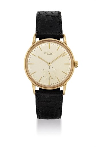 PATEK PHILIPPE. AN 18K GOLD AUTOMATIC WRISTWATCH.