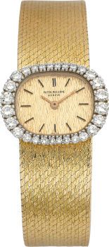 Patek Philippe Ref. 3394/1 Lady's Diamond Gold Wristwatch....