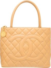 Chanel Beige Quilted Caviar Leather Medallion Tote Bag with Gold.Hardware. Very Good Condition. 12 Width x 9.5 Height x...