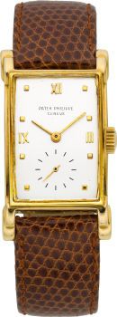 Patek Philippe Rare Ref. 2415 Unusual Very Fine Gold.Rectangular Wristwatch, circa 1950....