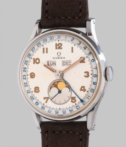Omega Follow;Ref. 2471/1;A rare and very fine stainless steel triple calendar wristwatch with two-tone dial, luminous hour markers and hands, moonphases and original box