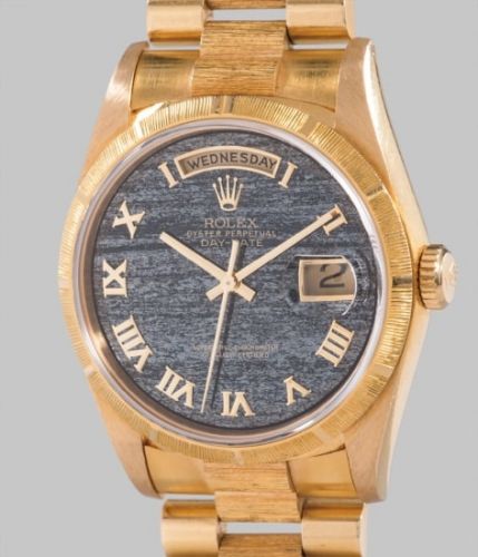 Rolex Follow;Ref. 18248, stamped 18200 inside case back;A rare yellow gold calendar wristwatch with centre seconds, bracelet, ferrite dial and original punched guarantee