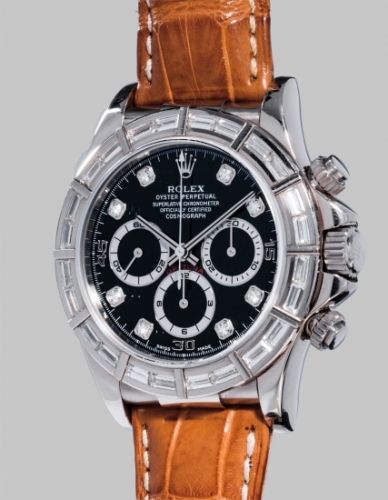 Rolex Follow;Ref. 16589;A fine, rare and attractive white gold and diamond-set chronograph wristwatch