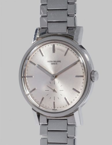 Patek Philippe Follow;Ref. 3466;A very rare and highly attractive stainless steel wristwatch with silvered dial and bracelet