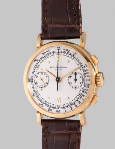 Patek Philippe Follow;Ref. 591;A fine, very rare and attractive yellow gold chronograph wristwatch with "bean"-shaped lugs