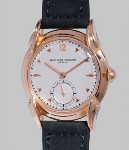Vacheron Constantin Follow;Ref. 4418;A rare and attractive pink gold wristwatch with silver dial, flame shaped lugs, original Certificat d'Origine et de Garantie and retailer's presentation box