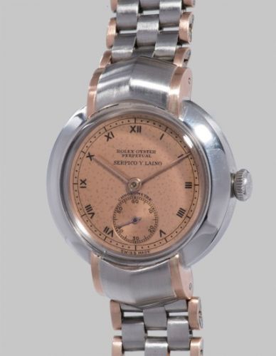 Rolex Follow;Ref. 3627;An extremely rare and highly attractive stainless steel and pink gold plated wristwatch with hooded lugs and bicolor rice grain bracelet, retailed by Serpico y Laino