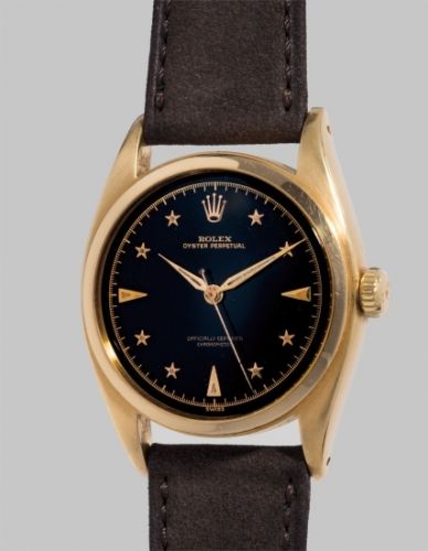 Rolex Follow;Ref. 6088;An extremely rare and beautiful wristwatch with sweep center seconds, star-set numerals, black lacquer dial and bracelet