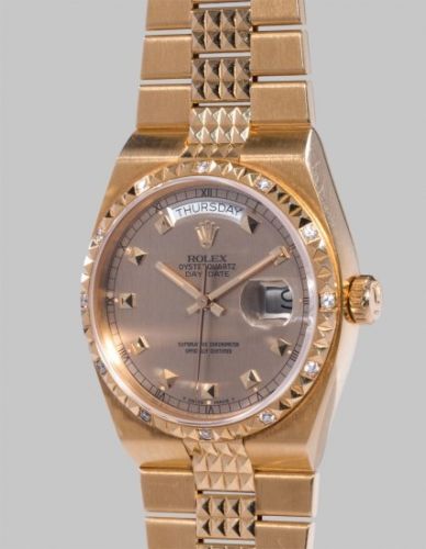 Rolex Follow;Ref. 19038;A fine and very rare yellow gold and diamond-set calendar wristwatch with bracelet