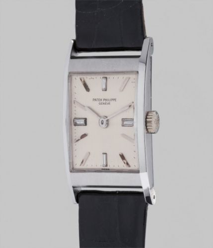 Patek Philippe Follow;Ref. 2461;A fine and rare rectangular white gold and diamond-set wristwatch