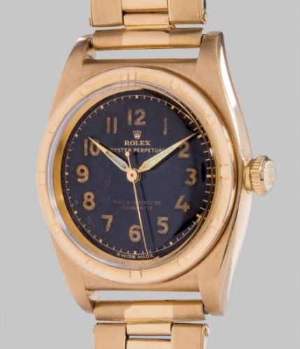 Rolex Follow;Ref. 3372;A fine and attractive yellow gold wristwatch with black dial and bracelet