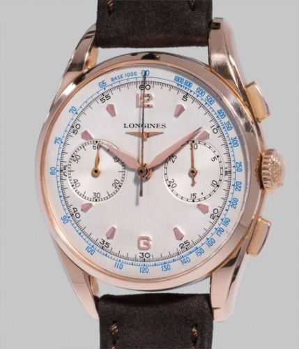 Longines Follow;Ref. 6595 1;A fine and attractive pink gold flyback chronograph wristwatch with blue tachymeter scale