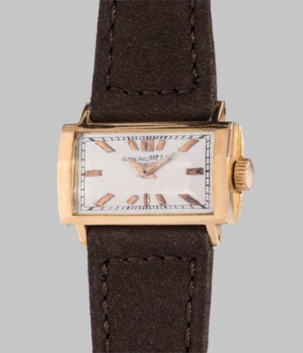 Patek Philippe Follow;Ref. 139;A very rare yellow gold rectangular horizontal driver's wristwatch with faceted case and crystal