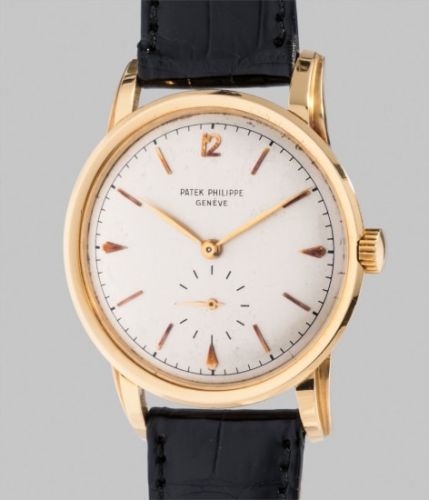 Patek Philippe Follow;Ref. 2452;A fine and attractive yellow gold wristwatch with stepped downturned lugs