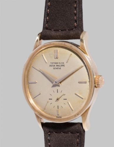 Patek Philippe Follow;Ref. 2597;A fine and rare yellow gold traveller's wristwatch with separately adjustable hour hand, retailed by Tiffany Co.