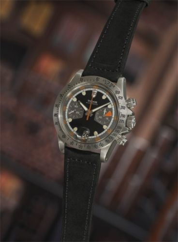 Tudor Follow;Ref. 7032/0;A very rare and attractive stainless steel chronograph wristwatch with matte black dial, tachymeter bezel, and date.