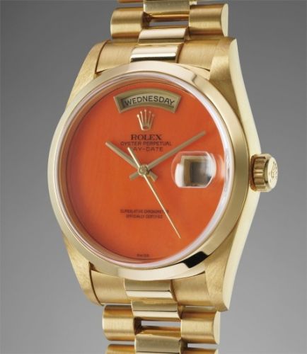 Rolex Follow;Ref. 18208;A highly rare and very attractive yellow gold calendar wristwatch with centre seconds, coral dial and bracelet