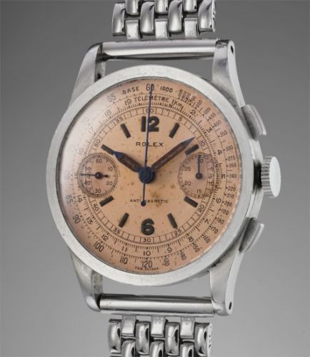 Rolex Follow;Ref. 2811;An fine and rare stainless steel chronograph wristwatch with salmon coloured dial and stainless steel bracelet
