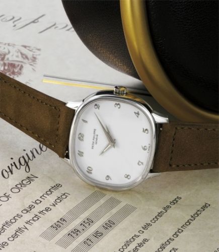 Patek Philippe Follow;Ref. 3619;A highly attractive, large and extremely rare dual time wristwatch with white lacquer dial, Breguet numerals, original certificate and fitted presentation box