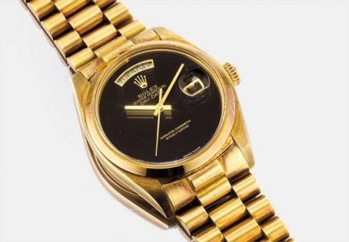 Rolex Follow;Ref. 18028;A very fine and attractive gold wristwatch with sweep centre seconds, day, date, onyx dial and bracelet