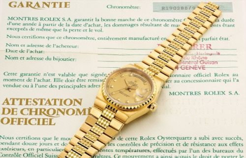 Rolex Follow;Ref. 19028;A fine and rare gold Quartz Day-Date with 'Pyramide' bracelet, original certificate and presentation box, retailed by Bucherer