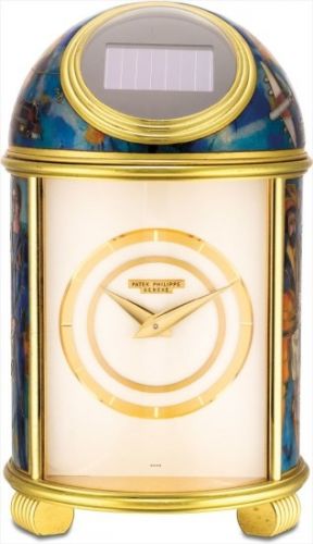 Patek Philippe Follow;Ref. 754;An extremely fine and unique gilt brass solar power dome table clock with cloisonné enamel scene, 'Teinturerie' signed MD, with fitted presentation box