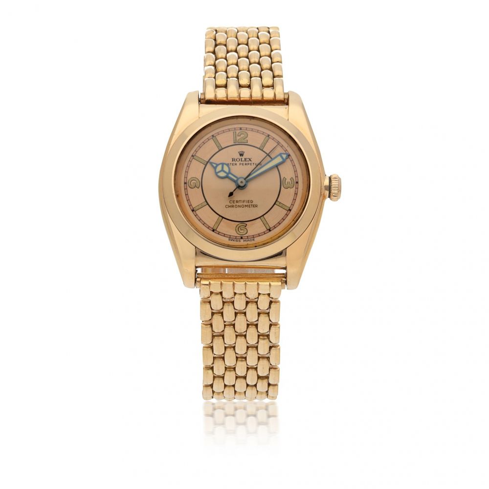 ROLEX | 'BUBBLEBACK', REF 3131 PINK GOLD WRISTWATCH WITH BRACELET CIRCA 1938