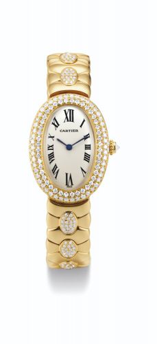 Cartier A LADY'S YELLOW GOLD AND DIAMOND-SET OVAL WRISTWATCH WITH BRACELET REF 1950 BAIGNOIRE CIRCA 2000