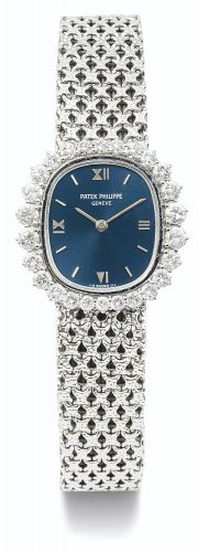 Patek Philippe A LADY'S WHITE GOLD AND DIAMOND-SET BRACELET WATCH REF 4137/1 MVT 1260453 CASE 2707800 MADE IN 1972