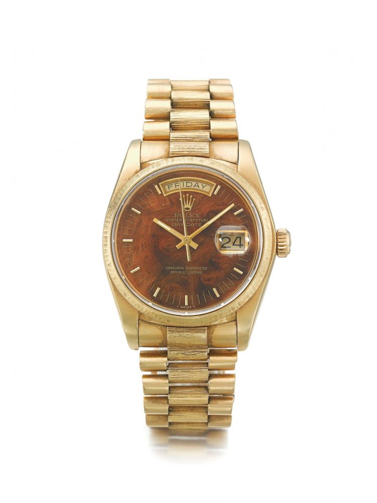 ROLEX | REF 18078/18000 DAY-DATE | A YELLOW GOLD AUTOMATIC WRISTWATCH WITH DAY, DATE, BRACELET, AND WOOD DIAL CIRCA 1984